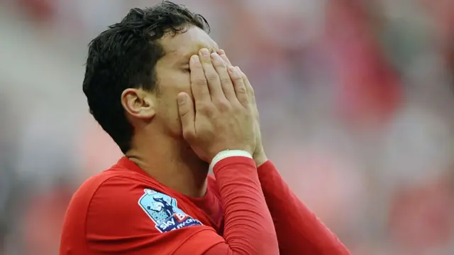 Orient's Mathieu Baudry with his head in his hands after missing his penalty in the 2014 play-off final