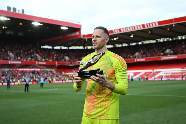 Matz Sels of Nottingham Forest poses for a photo with his Premier League Golden Glove 2024/25 award, which he has jointly won with David Raya of Arsenal (not pictured), after the Premier League match between Nottingham Forest FC and Chelsea FC at City Ground on May 25, 2025