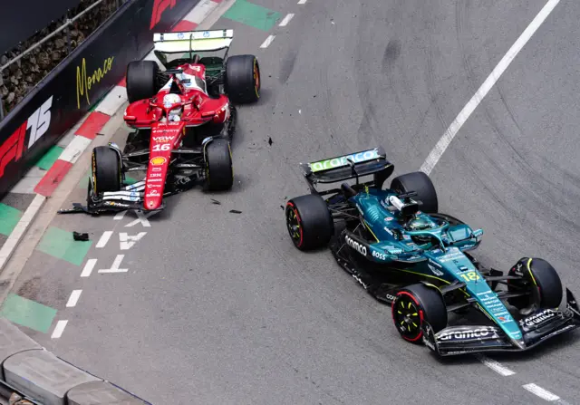 Charles Leclerc and Lance Stroll collide