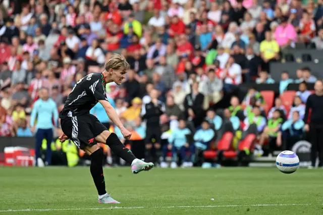 Martin Odegaard of Arsenal scores his team's second goal