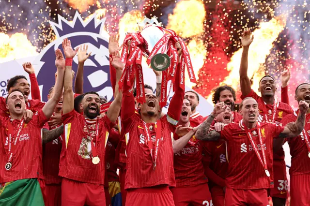Virgil van Dijk of Liverpool, lifts the Premier League trophy