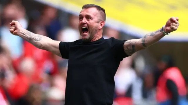 Nathan Jones celebrates
