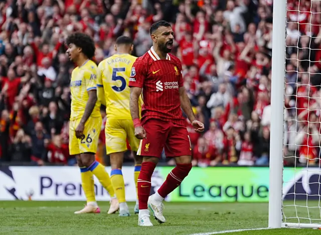 Liverpool's Mohamed Salah celebrates scoring their side's first goal of the game