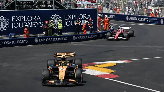Lando Norris leads Charles Leclerc