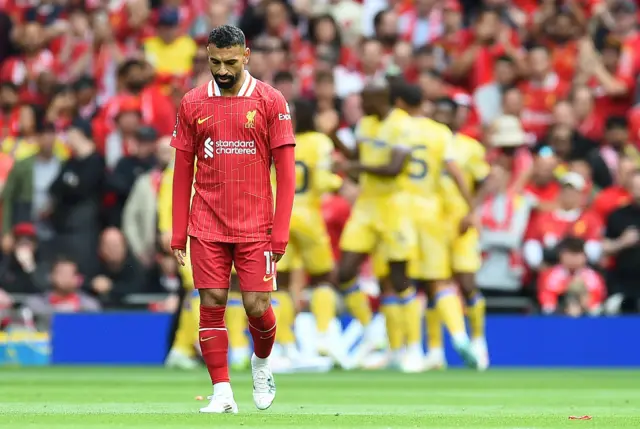 Mohamed Salah of Liverpool reacts