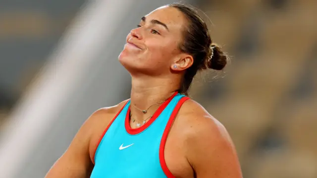 Aryna Sabalenka reacts after missing a point