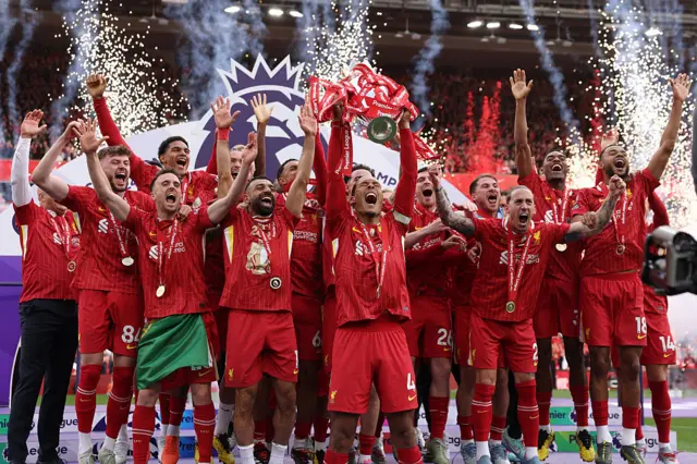 Virgil van Dijk lifts the Premier League title