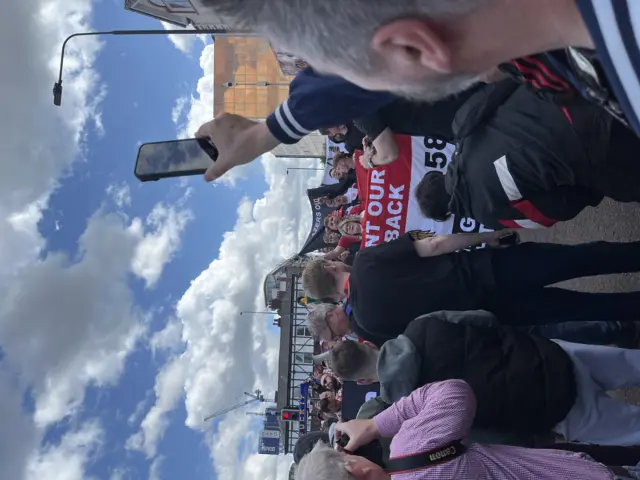 Manchester United fans protesting outside Old Trafford