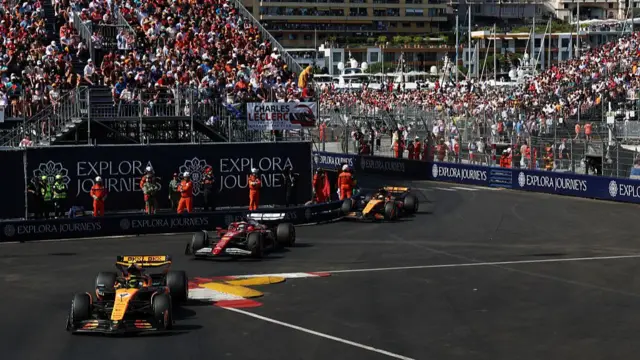 Lando Norris ahead of Charles Leclerc and Oscar Piastri