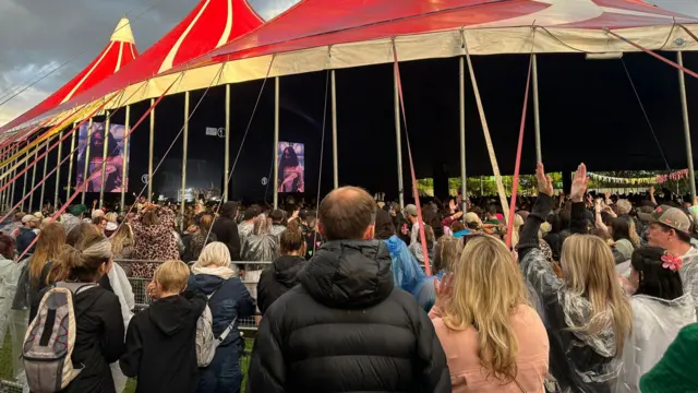 Crowds of people look on as Jade appears on the New Music Stage in Liverpool
