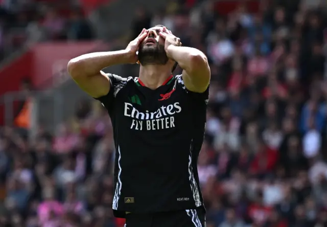 Arsenal's Mikel Merino reacts after he misses a chance to score