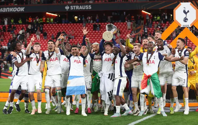 Spurs lift the Europa League trophy after winning the 2025 final