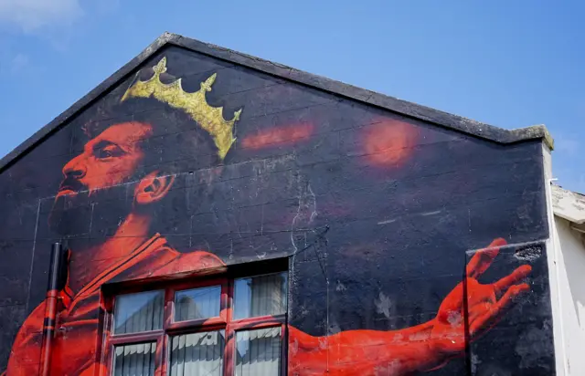 A tribute mural of Liverpool's Mohamed Salah outside the ground before the Premier League match at Anfield, Liverpool.