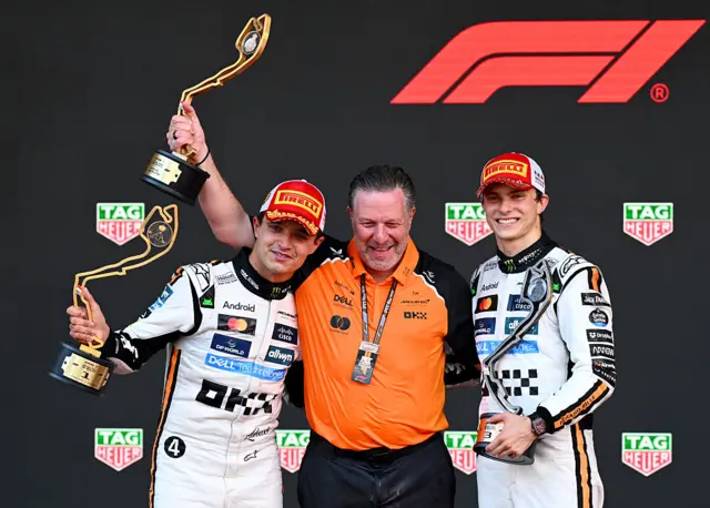 Lando Norris, Zak Brown and Oscar Piastri in Monaco