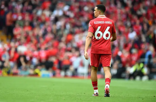 Trent Alexander-Arnold of Liverpool looks on