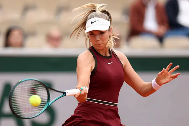 Katie Boulter plays a forehand