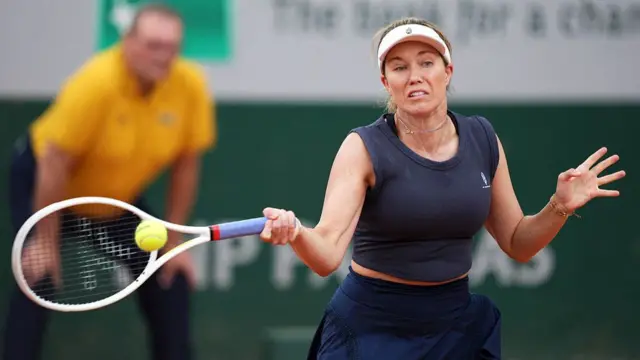 Danielle Collins plays a forehand return