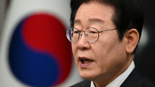 Lee Jae-myung delivers a public statement on the impeachment motion against acting president Han Duck-soo at the National Assembly in Seoul on 27 December, 2024.