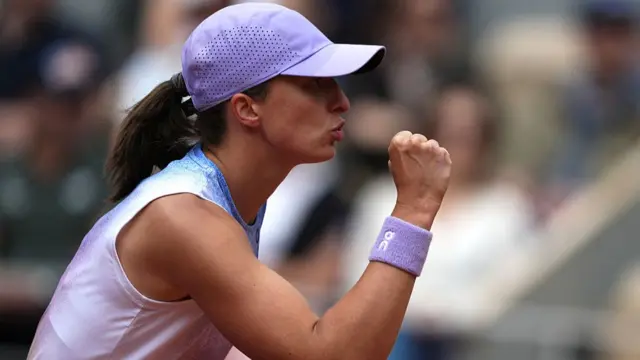 Poland's Iga Swiatek reacts after a point