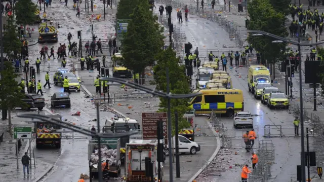 Aerial shot of emergency services arriving at the scene