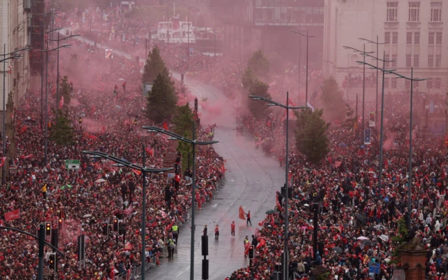 Thousands upon thousands of Liverpool supporters lined the streets of the city as the parade took a 10-mile route towards the riverside