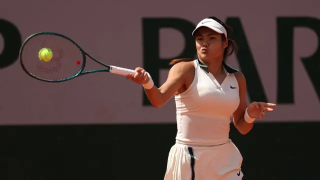 Emma Raducanu plays a forehand