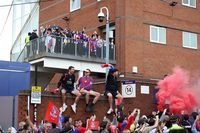 Fans climbed the walls of Selhurst Park and cheered as the parade got closer