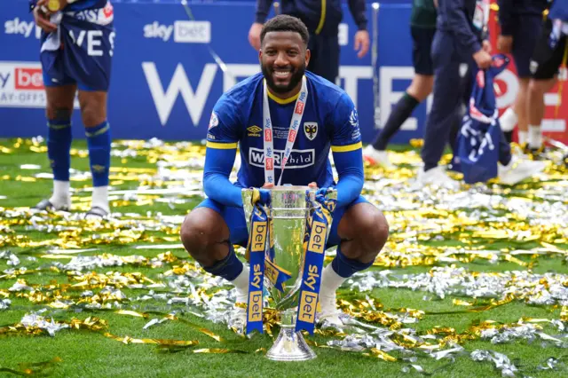 Myles Hippolyte with the trophy