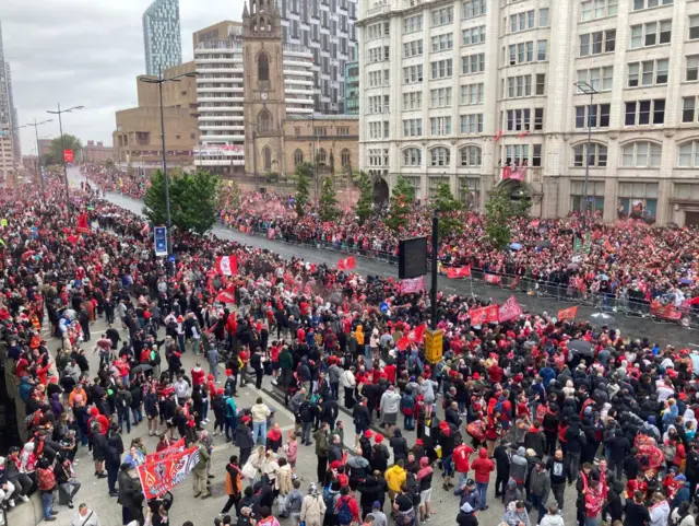 Crowd of people in front of the Liver Building