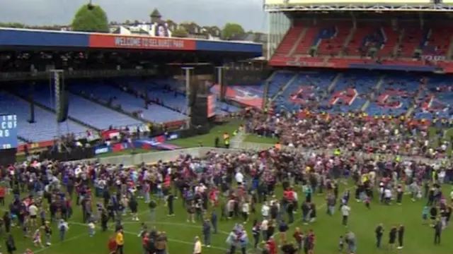 People stood on a football pitch