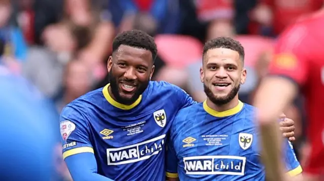 Myles Hippolyte and Marcus Browne celebratew
