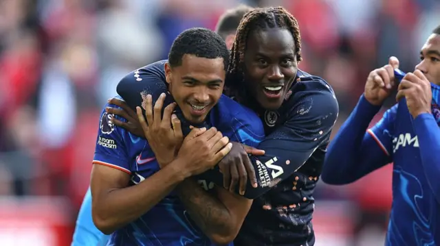 Trevoh Chalobah celebrates with Levi Colwill