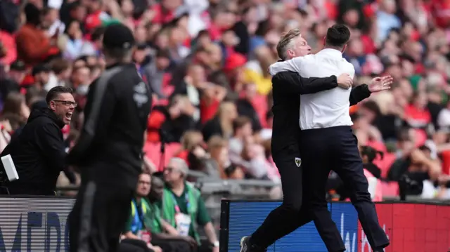 AFC Wimbledon manager Jonnie Jackson celebrates