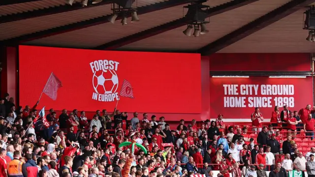 A screen at the City Ground displaying the words 'Forest in Europe'