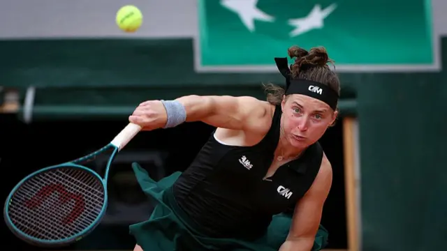 Carole Monnet serves