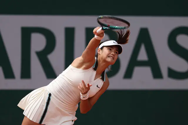 Emma Raducanu serves