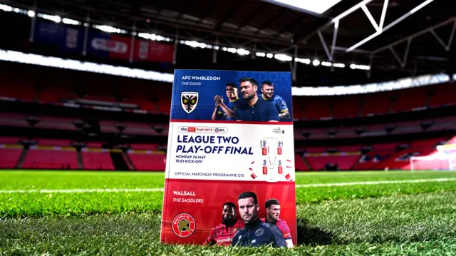 The League Two play-off final matchday programme on the Wembley pitch