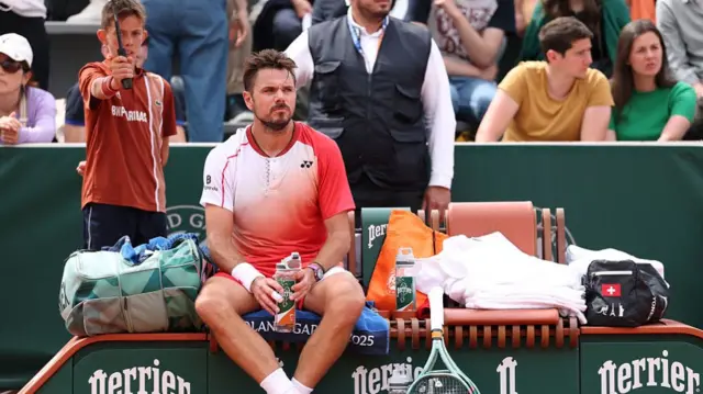 Stan Wawrinka looks on from his bench