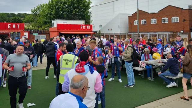 Crystal Palace fans gathered around fan area in Selhurst Park
