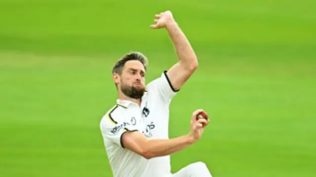 Chris Woakes running into bowl