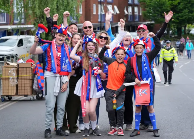A family cheer on crystal palace