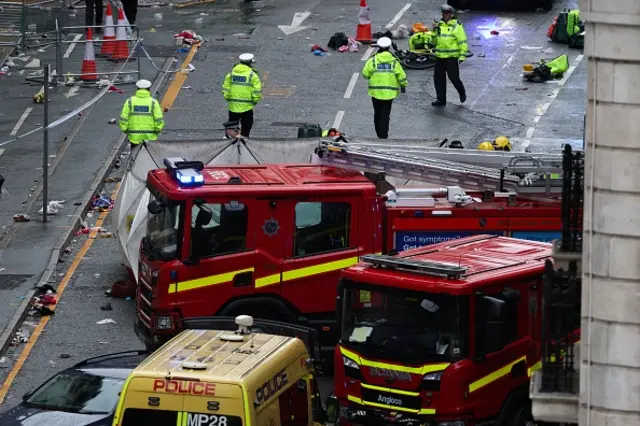 Emergency services at the scene after multiple people were hit by a car during the Victory parade