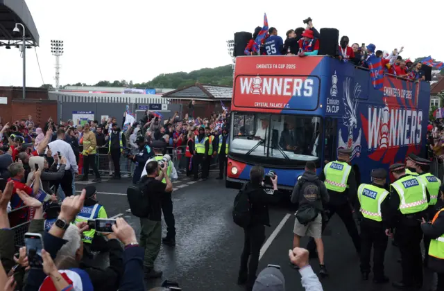 The open-top bus arrives at Selhurst Park