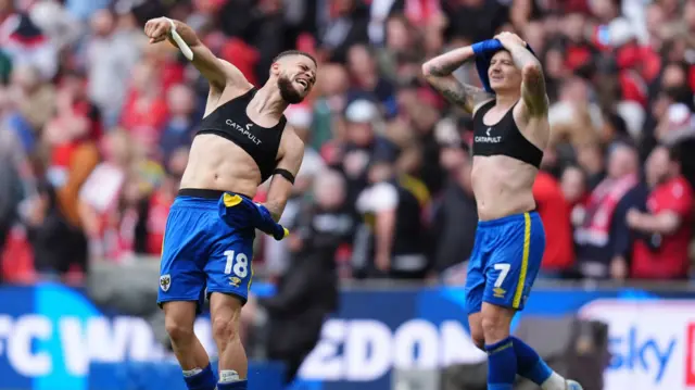 Marcus Browne and James Tilley celebrate at the final whistle