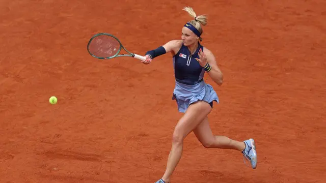 Rebecca Sramkova of Slovakia plays a forehand