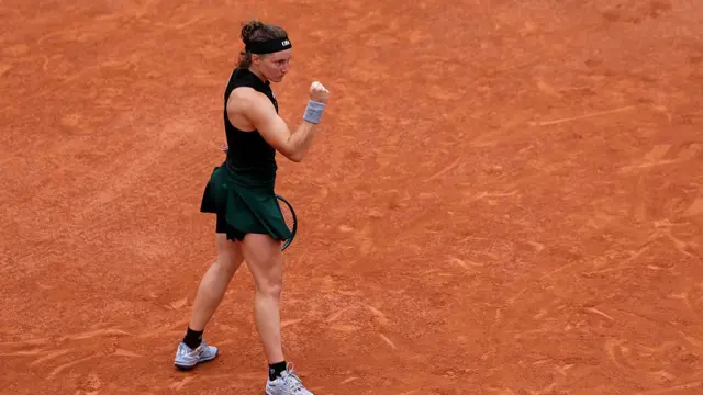 Carole Monnet reacts after a point