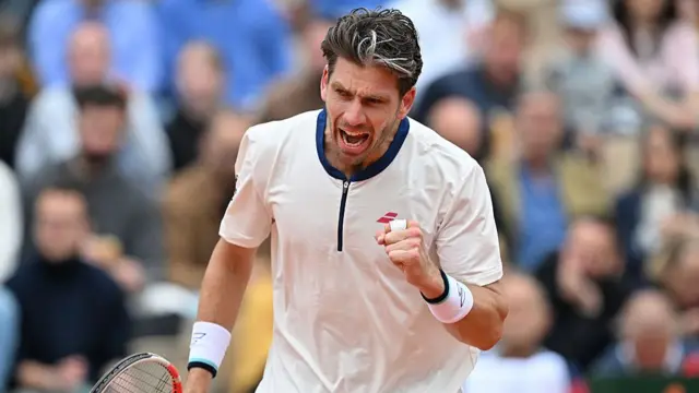 Cameron Norrie encourages himself on