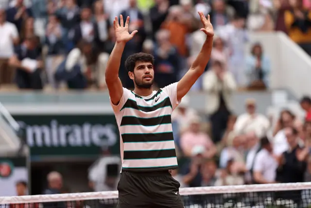 Carlos Alcaraz of Spain celebrates his victory over Giulio Zeppieri