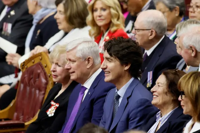 Canada former Prime Ministers Justin Trudeau and Stephen Harper look on inside the senate