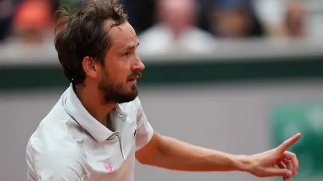 Daniil Medvedev gestures as he plays against Cameron Norrie